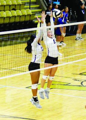 The Alpine Lady Buck JV volleyball team took guarding the net seriously during their recent play inAndrews Photo by Julie Hawkins