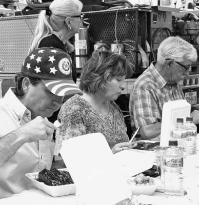 Judge Roy Ferguson and his wife Pene, along with John Jordan judge rib entries at this past weekends’ Smoke in the Mountains BBQ and Ribeye Shootout.