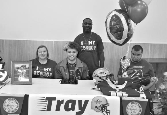 Tray Ervin signed a letter of intent to play football for Hardin Simmons University on Tuesday. Tray is shown here with his family. Photo by Felipe Fierro