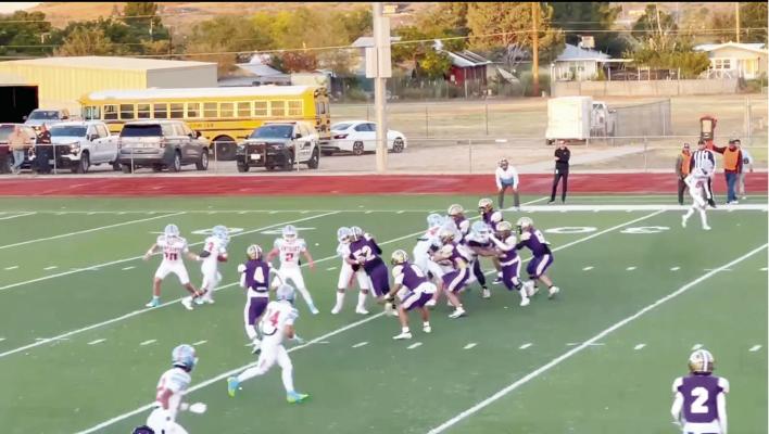The Bucks work to shut down a Wildcat offensive drive early in the game on Friday night. Courtesy photo