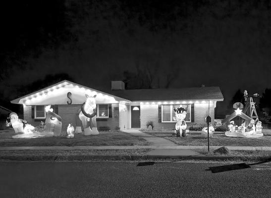 This house in the Carpenter addition has decorated their lawn for the holidays with a horse, a cow, a pig, and of course the true meaning of the Christmas holiday, a Nativity scene. Photo by Kara Gerbert