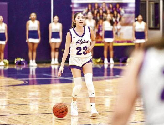 Lady Buck Andynne Ramirez talks to her teammates as she heads towards the paint in a recent game. Photo by Felipe Fierro