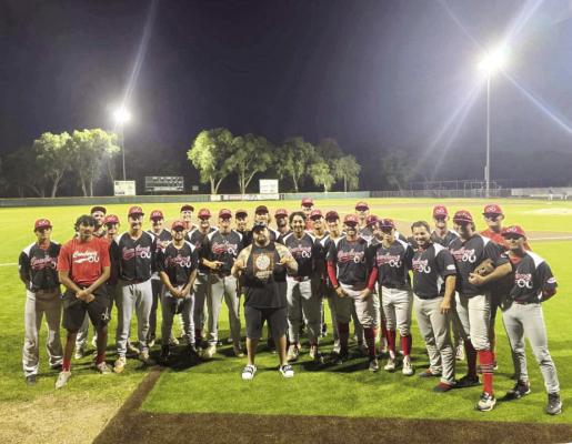 The Alpine Cowboys took time for a group photo after their win over the Wind in Garden City, KS.
