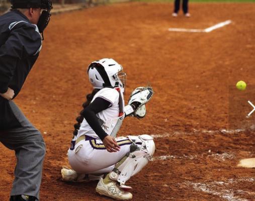 Zariah Galvan plays sentinel at home plate for the Lady Bucks in a recent game. Courtesy photo