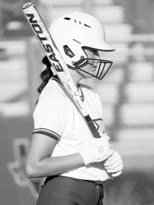 Lady Buck senior Hannah Juett awaits the opposing team pitcher at one of the recent Alpine home games. Photo by Annika Canaba-AMC Photography
