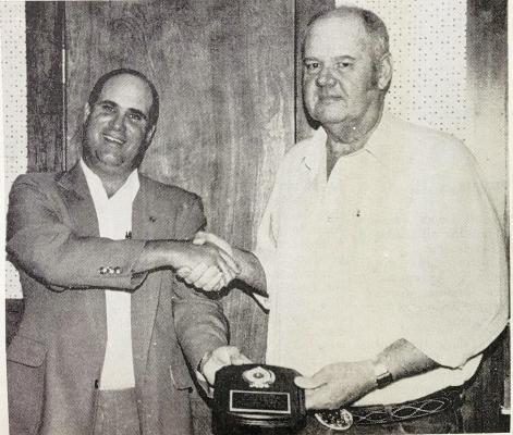 March 10, 1988 – Fort Davis schools superintendent Bryan LaBeff presented an award to the Fort Davis Lions Club for all its help and volunteer work at the schools. Wid McCutcheon (R) accepts as the Lions president.