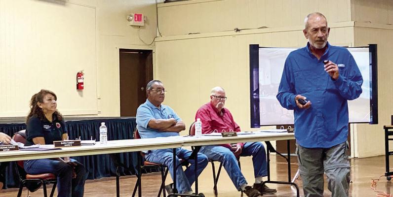 Philip Cornett, from John Crown and Associates, spoke on behalf of the Dollar General during Tuesday’s City Council meeting, as a large crowd gathered to show opposition to the proposed new store construction at 1911 N. State Highway 118. Avalanche photo by J.T. Maroney
