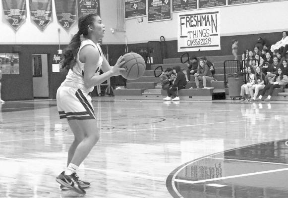 Gyllian Morrissey prepares to shoot beyond the paint in a recent home game. Photo by Kara Gerbert