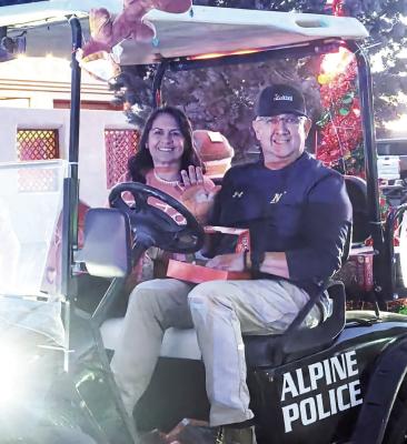 For the first time in recent history, the Alpine Christmas parade had a grand marshal. Alpine Police Chief Darrell Losoya, with his wife, Belen, bid a final farewell as a City of Alpine employee. Photo by Kara Gerbert