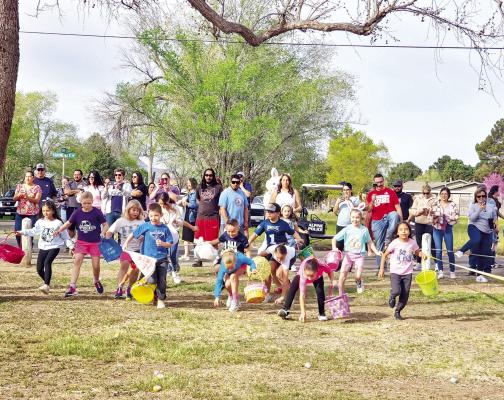 The Alpine Kiwanis Club held its annual easter egg hunt on Saturday morning at Kokernot Park. Local kids charged across the grassy playground to collect eggs. They followed this up by taking photos with the easter bunny. Photo by Kara Gerbert