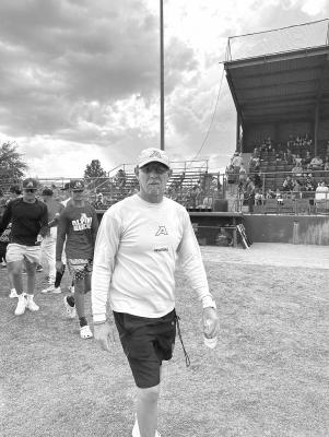 Alpine High School’s head girls’ softball coach Christopher Virdell was caught off-guard by the camera during opening day at Kokernot Field last Thursday. Courtesy photo