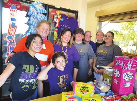 Buck Band Boosters step up and pitch in