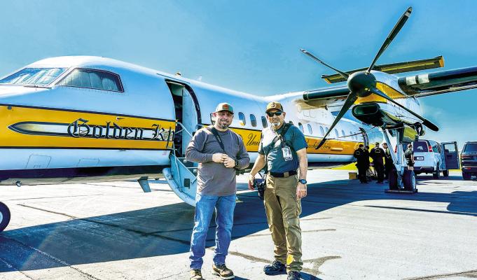 Audiovisual Specialist Jerry Duenes and Multimedia Imaging Specialist Ervey Martines flew with the U.S. Army Parachute Team, the Golden Knights. Photo by Ervey Martinez