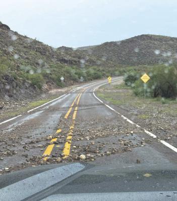Recent heavy rains in the area have closed roads and left them full of rocks and debris. This photo, shared by Big Bend Ranch State Park, shows rocks from runoff across Highway 170 in the park. Courtesy photo