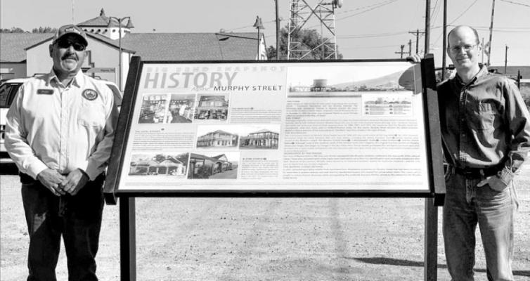 City of Alpine Public Works Director Eddie Molinar and Tourism Director Chris Ruggia stand with the new sign on Murphy Street. Courtesy photo