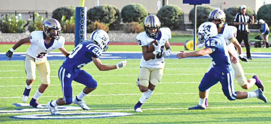 Fightin’ Buck Oscar Velasquez runs with the ball during Alpine’s Sept. 3 game in Fort Stockton. Photos by Felipe Fierro