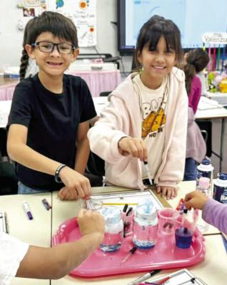 Third graders at Alpine Elementary spent some time last week learning about weather by engaging in hands-on experiments at different stations in the classroom. Students learned about wind and clouds as well as precipitation and temperature. Courtesy photo