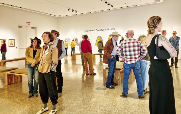 Area art enthusiasts were on hand last Friday evening for the opening reception of Andy Warhol’s Cowboys and Indians art display. This 14-piece series was the last set of work by Warhol produced in 1986 just prior to his death in 1987 Photo by Kara Gerbert