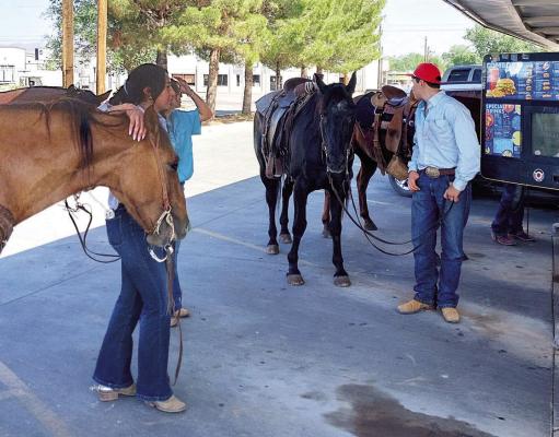 Horses are sometimes a familiar sight in downtown Alpine, especially at Sonic, where their riders like to stop for a cold beverage. Photo by Ric Edwards