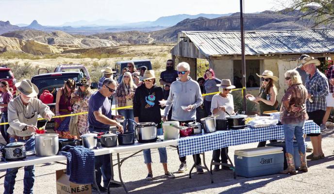 Terlinguans and visitors line up to partake in a “bowl of good luck” at the annual Terlingua Pea-Off held each New Year’s Day in the Ghostown. Photo by Kara Gerbert