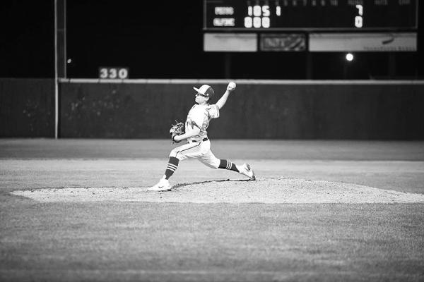 Teagan Emerson hurls the baseball towards home plate, in last season’s season opener against Pecos. This year’s Fightin’ Buck baseball team will face the Pecos Eagles again in the season opener in Pecos. Courtesy photo