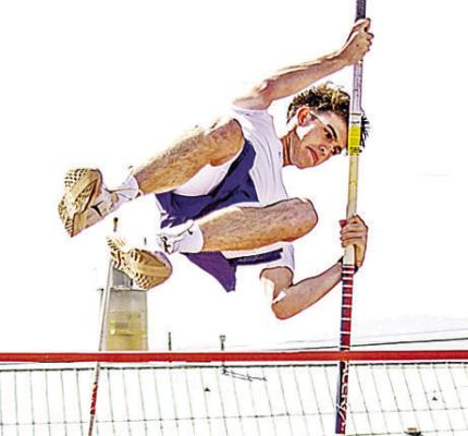 Jack Juett took the firstplace spot for the boys’ varsity pole vault in last Thursday’s District track meet. Juett vaulted to an impressive height of 9’6” for the win. Photo by Kara Gerbert