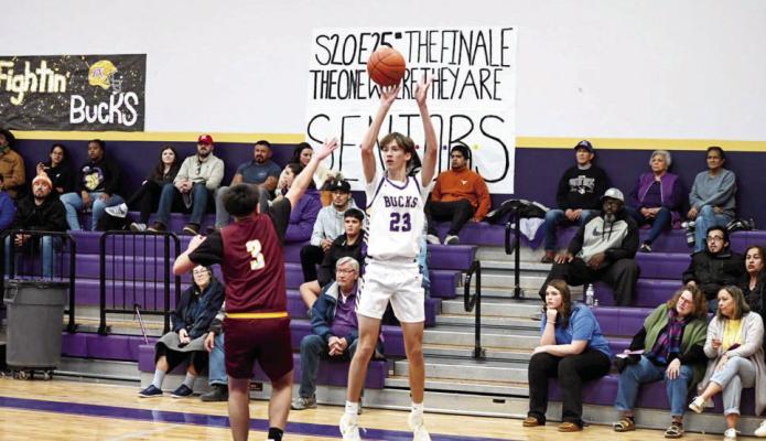 Senior Kelton Tarrant looks for an open teammate as the Bucks took on the Kermit Yellowjackets last season at home. Photo courtesy of Felipe Fierro