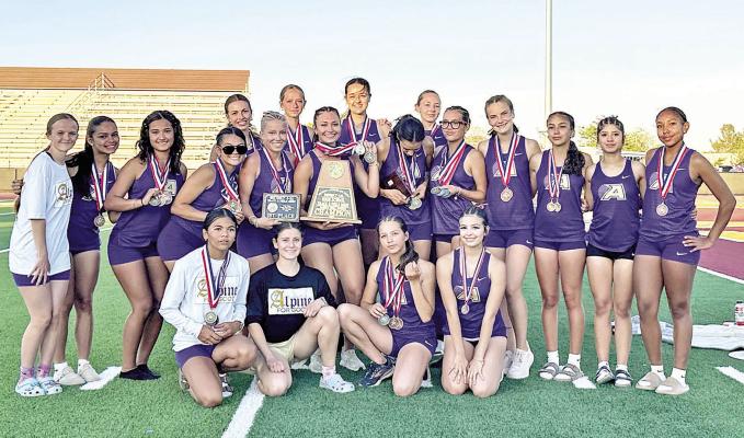 The AHS varsity girls’ track team took the District 4-3A Championship for the sixth year in a row last Friday afternoon in Kermit. Photo by J.T. Maroney