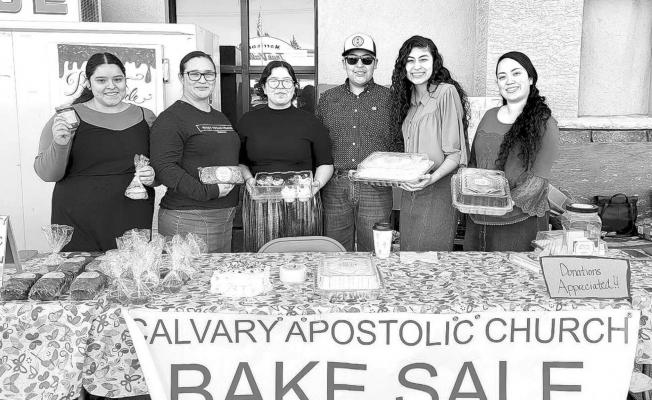 Calvary Apostolic Church youth group members Sarali Lopez, Lisa Miaan, Lisa Rojo, Vincent Carrasco, Victoria Carrasco, and Vicky Carrizales show off their baked goods during a fundraiser held on March 5 in front of Porter’s in Alpine. Avalanche photo by Roxanne Hill