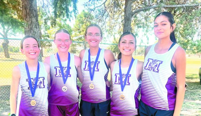 The Lady Mustangs brought home some hardware from this past weekend’s Big Bend Mountain Ramble at Kokernot Field. From left is Gracie Dabbs (8th place, middle school), Riley Hayslip (6th place, middle school), Kenzie Hayslip (7th place, JV), Aliyah Aguilar (4th place, varsity), and Izabella Briones (6th place, varsity). Photo courtesy of Marathon ISD