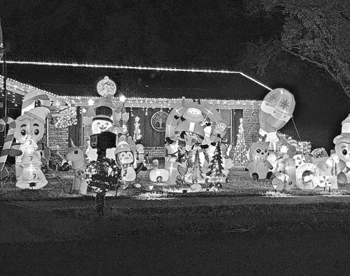 Alpine residents have gone all out this season, decorating their yards and houses with Christmas cheer. Photo by Kara Gerbert