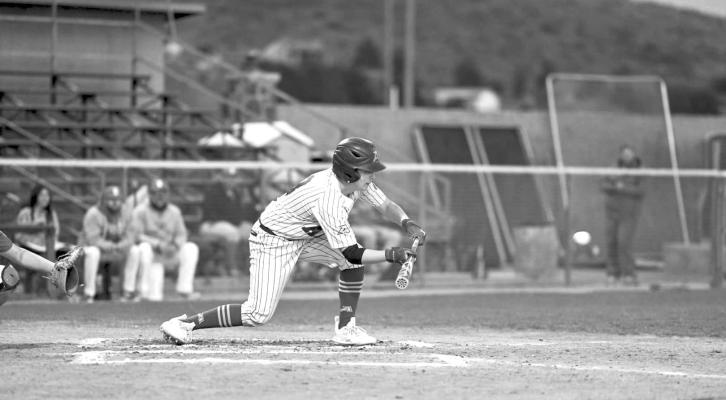 Alpine’s Peyton Tays attempts a bunt in last week’s game against the Stanton Buffaloes. Photo by Felipe Fierro