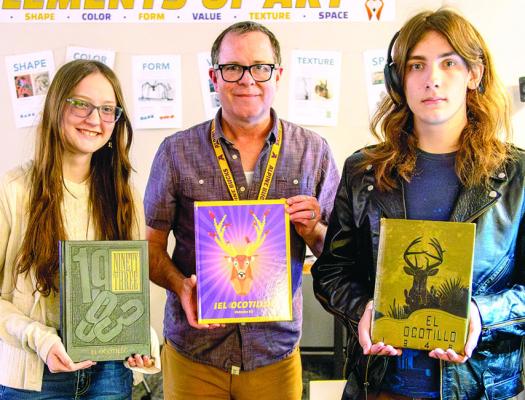 AHS Junior Lillian Stewart, yearbook advisor Vaughn Grisham, and AHS senior Evan Frioux have digitized editions of the Alpine Buck yearbooks, El Ocotillo, with the use of the district’s new CZUR ET24 Pro scanner. The yearbook staff has scanned and restored editions from 1948 to 1993 so that they are freely available to AHS alumni and the community. Digitized editions may be found at https://bit.ly/ elo#alpinehighschool Photo courtesy of Violet Mack