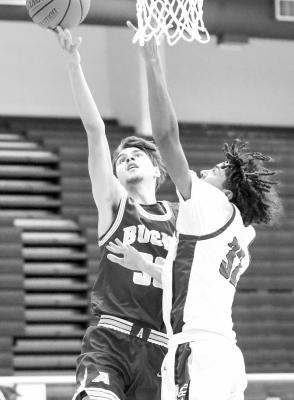 Ferris Daley gears up for a shot against Fort Stockton during tournament play. Photo by Shawn Yorks