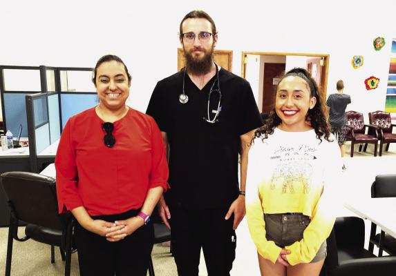 Having just completed her first year in the Primary Care Pathway Program, a former Alpine High School graduate is fasttracking her way to becoming a doctor. From left is her mom, Virginia Acosta, Second year medical student at Texas College of Osteopathic Medicine, John Michael Markgraff, and premed student and former AHS graduate, Lourdes Acosta. Avalanche photo