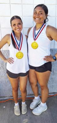 Neveah Sanchez and Hokulani Tofiga show off their first-place medals from the girls’ doubles competition in Fort Hancock.