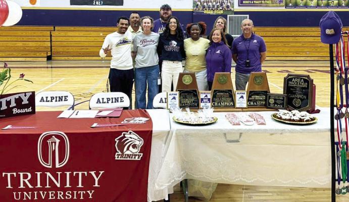Earlier this month, AHS senior Emiliana Hernandez signed with Trinity University as a member of their track and field team. Emy, as most call her, is pictured here with her coaches, in back, Coach Mark Miranda, Coach Jackson Yezak, and Trainer Lori Santry. In front are Coach Doug Gray, Coach Cory Cason, Hernandez, Coach Taryn Johnson, Coach Linda Morris, and Coach Jerry Dominguez. Courtesy photo