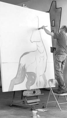 RIGHT: Chris Ruggia paints “Pronghorn.” Courtesy photo