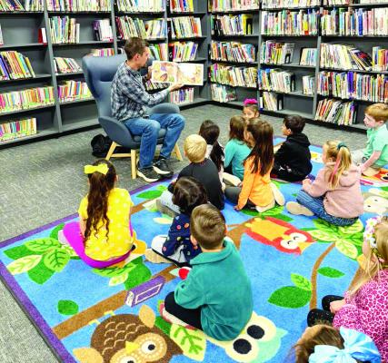 Alpine Elementary’s Read Alpine program is up and running in the new year, with volunteers such as Coleman Reidling, who is the pastor at First Baptist Church here in Alpine, taking time to read to these elementary students. Courtesy photo