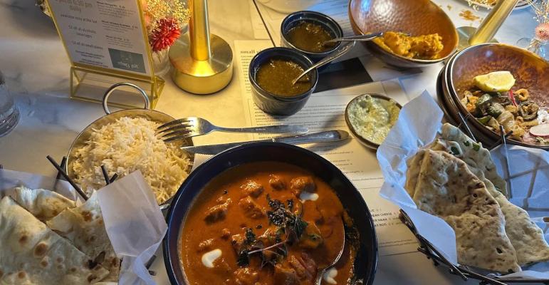 Curries, rice, and naan at The Clay Pit. Courtesy photo