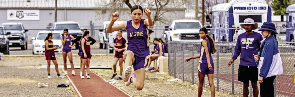 Caisyn Hinojos pushes herself as far as she can during the girls’ long jump event last Wednesday at Alpine’s Middle School District track meet. Photo by Kara Gerbert