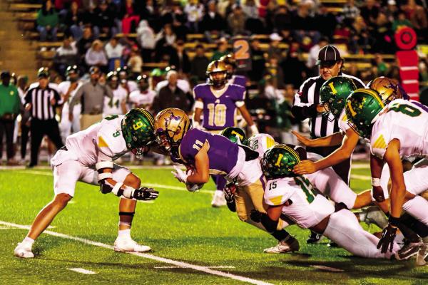 Logan Smith carries the ball in play during the Buck’s Area game against Idalou last week. Photo by Zayden Camargo