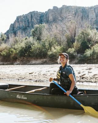 Tara Shackelford Lorenz is ready for an adventure down the Rio Grande. With water levels low due to the drought, canoes are the best way to see Big Bend from a different angle. Photo courtesy of Hidden Dagger Adventures