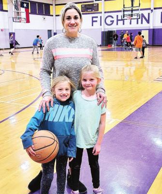 Elizabeth Mesker with Little Dribblers Brooke Mesker, 6, and Gwen Hicks, 6. Avalanche photo by Roxanne Hill