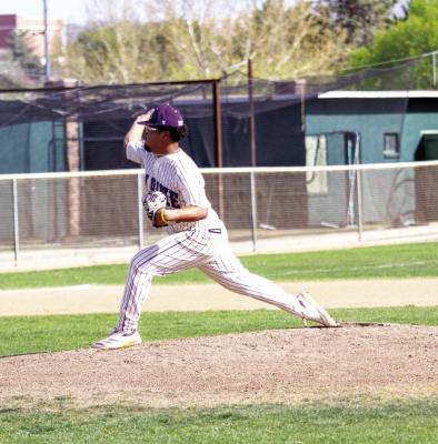 Senior Alec Ramos delivers on the mound, helping to lead the Bucks to their first District title in eight years. Photo by Kara Gerbert