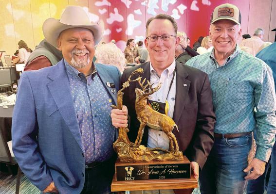 Dr. Louis Harveson, founder of the Borderlands Research Institute at Sul Ross State University, was honored as Conservationist of the Year at this year’s Houston Safari Club Foundation Banquet. Harveson is pictured with Leo Martinez, Vice President of the Houston Safari Club Foundation, and Mack Hay. Photo courtesy of Madison Martinez
