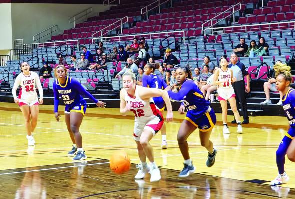 Sul Ross Lady Lobo Marley Rokas (32) chases after a loose ball during a home game at the Gallego Center earlier this season against Western New Mexico College. Rokas, a junior, is just five points shy of a career 1,000 points in her three years playing for Sul Ross. She will get her chance to become a part of the 1,000-point club this coming Saturday in their season finale in Brownwood against Howard Payne. Photo by Kara Gerbert