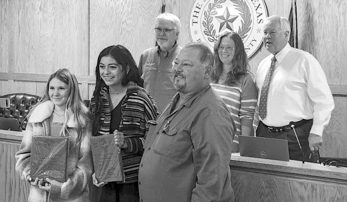 The commissioner’s court recognized two Marathon students at the last meeting. Pictured here are Commissioners Jim Westerman and Sara Colando, Judge Greg Henington, Annaliese West, Izabella Briones, and Commissioner Ruben Ortega.