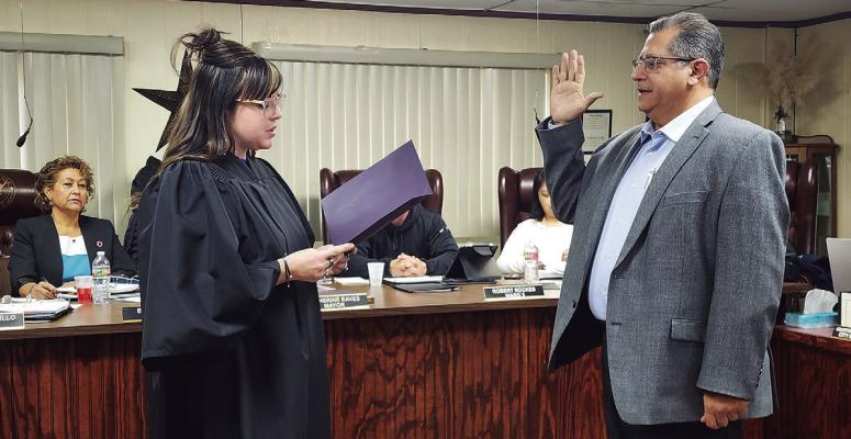 The Honorable Judge Elizabeth Lewis officially swore in Henry Arredondo as the City of Alpine’s new city manager. Photo by Kara Gerbert