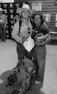 Clancey Newman takes a moment to get his picture taken with his mom as he readies himself for the Texas High School Rodeo Association finals in Abilene last week. Courtesy photo